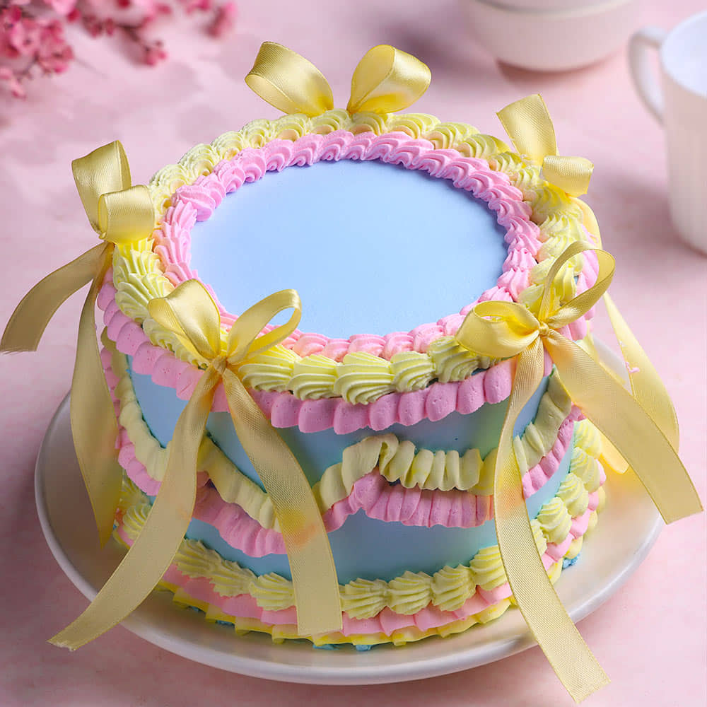 Front Angled View of Pastel Wrap Ribbon Cake